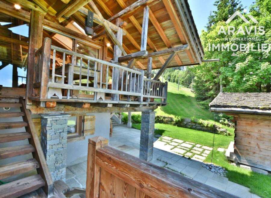 Discover the charm of this stunning wooden chalet, a perfect blend of rustic elegance and modern comfort.