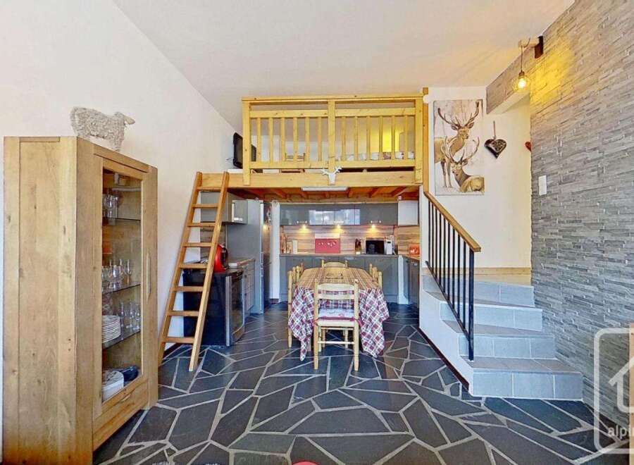 Discover this charming property featuring a cozy loft area, perfect for a unique living experience.