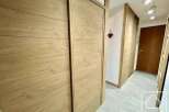 This stunning property boasts elegant wooden doors that add a touch of sophistication to the interior.