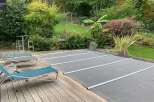 Enjoy the tranquility of this stunning property featuring a private pool and lush landscaping.