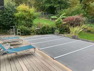 Enjoy the tranquility of this stunning property featuring a private pool and lush landscaping.