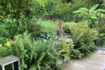 This stunning property boasts a lush, green garden, perfect for relaxation and outdoor enjoyment.