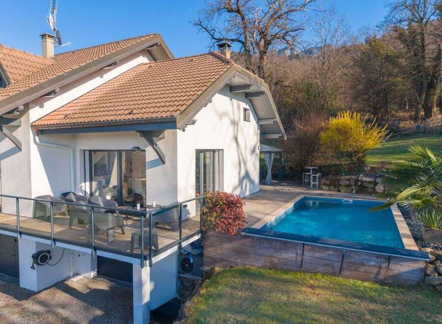Discover your dream home with this stunning property! Featuring a beautiful pool and a spacious deck, perfect for relaxation and entertaining.