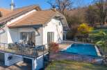 Discover your dream home with this stunning property! Featuring a beautiful pool and a spacious deck, perfect for relaxation and entertaining.