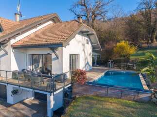 Discover your dream home with this stunning property! Featuring a beautiful pool and a spacious deck, perfect for relaxation and entertaining.