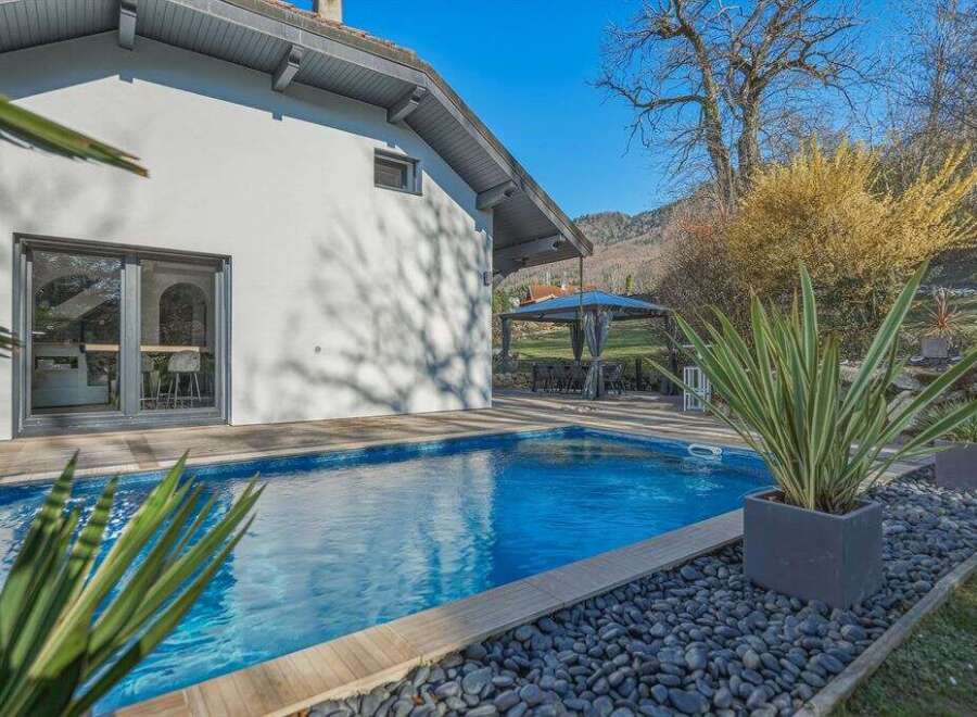 Discover your dream home with this stunning property featuring a private pool and a modern design.
