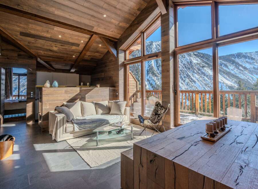 Experience luxury living in this stunning mountain chalet, boasting breathtaking views of snow-capped peaks.