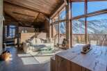 Experience luxury living in this stunning mountain chalet, boasting breathtaking views of snow-capped peaks.