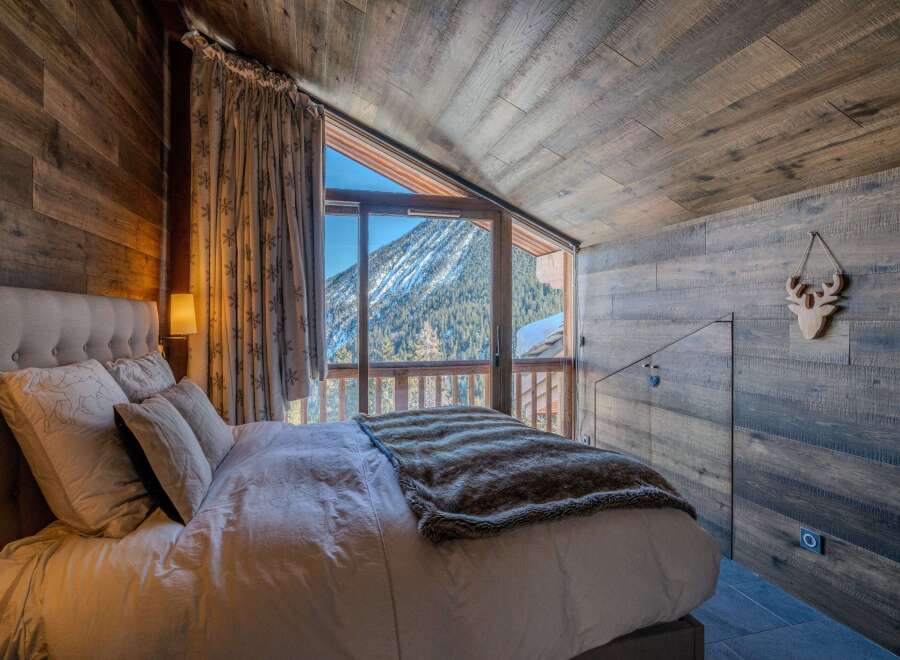 Experience the ultimate in alpine luxury with this stunning bedroom.