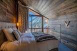 Experience the ultimate in alpine luxury with this stunning bedroom.
