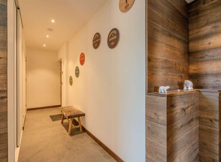 Step into this inviting hallway, showcasing a blend of rustic charm and modern design.