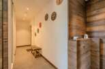 Step into this inviting hallway, showcasing a blend of rustic charm and modern design.