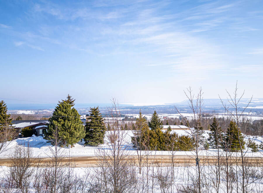 Enjoy breathtaking views from this stunning property! This home offers a serene escape with its picturesque surroundings, perfect for those seeking tranquility.