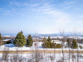 Enjoy breathtaking views from this stunning property! This home offers a serene escape with its picturesque surroundings, perfect for those seeking tranquility.
