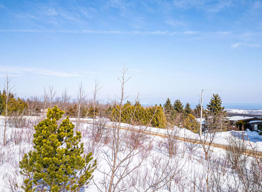 Discover the tranquility of this stunning property, nestled in a serene winter landscape.