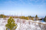 Discover the tranquility of this stunning property, nestled in a serene winter landscape.