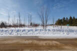 Explore the serene beauty of this winter landscape, perfect for those seeking a tranquil escape.