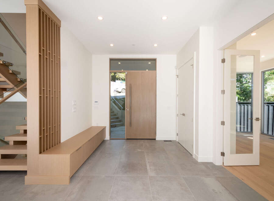 Step into modern elegance with this stunning entryway.