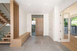 Step into modern elegance with this stunning entryway.