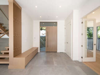 Step into modern elegance with this stunning entryway.