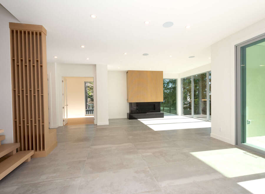 Step into modern luxury with this stunning property, showcasing an open-concept living space.