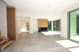 Step into modern luxury with this stunning property, showcasing an open-concept living space.