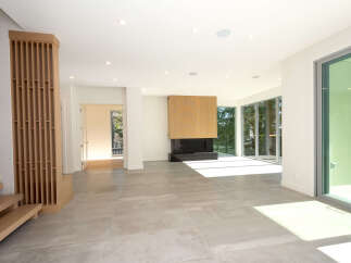 Step into modern luxury with this stunning property, showcasing an open-concept living space.