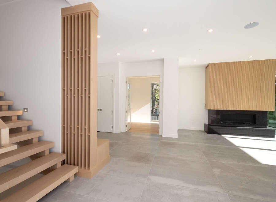This stunning modern home features a sleek, open-concept design with high-end finishes.