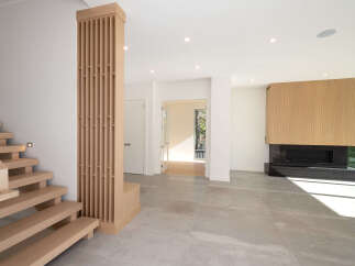 This stunning modern home features a sleek, open-concept design with high-end finishes.