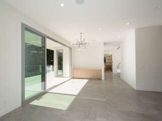 Step into modern luxury with this stunning property, featuring an open-concept design and abundant natural light.