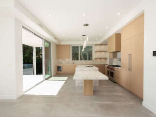 Step into modern luxury with this stunning kitchen.