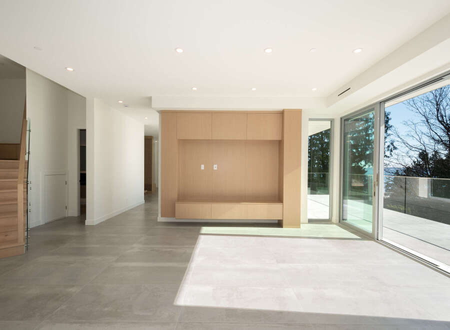 This stunning modern home boasts an open-concept living space with sleek, contemporary finishes.