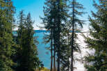 Enjoy breathtaking views of the water and surrounding nature from this stunning property.