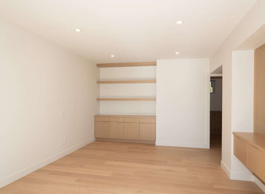 This stunning property boasts a modern interior with sleek lines and a neutral color palette.