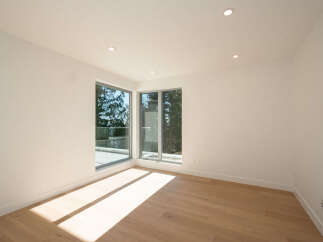 This stunning property boasts a modern interior with an abundance of natural light, perfect for creating a warm and inviting atmosphere.