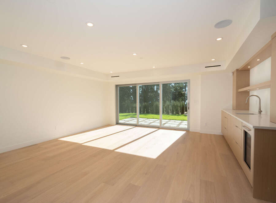 This stunning property boasts a modern interior with sleek finishes and ample natural light.
