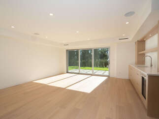 This stunning property boasts a modern interior with sleek finishes and ample natural light.