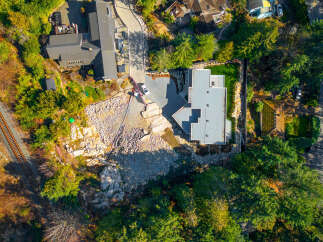 Discover this stunning property with a modern design and lush landscaping.