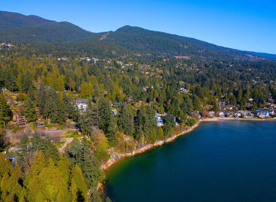 Discover a stunning coastal property nestled amidst lush greenery and breathtaking ocean views.