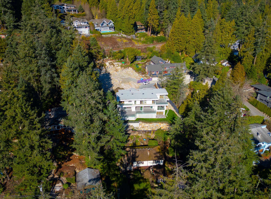 This stunning property offers a unique blend of modern design and natural beauty.