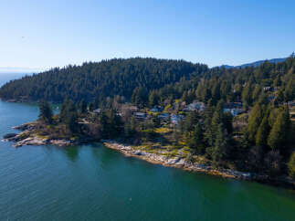 Discover the tranquility of coastal living in this stunning waterfront property.