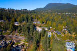 Nestled amidst lush greenery, this stunning property offers unparalleled privacy and breathtaking views.