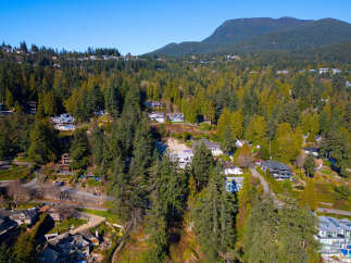 Nestled amidst lush greenery, this stunning property offers unparalleled privacy and breathtaking views.