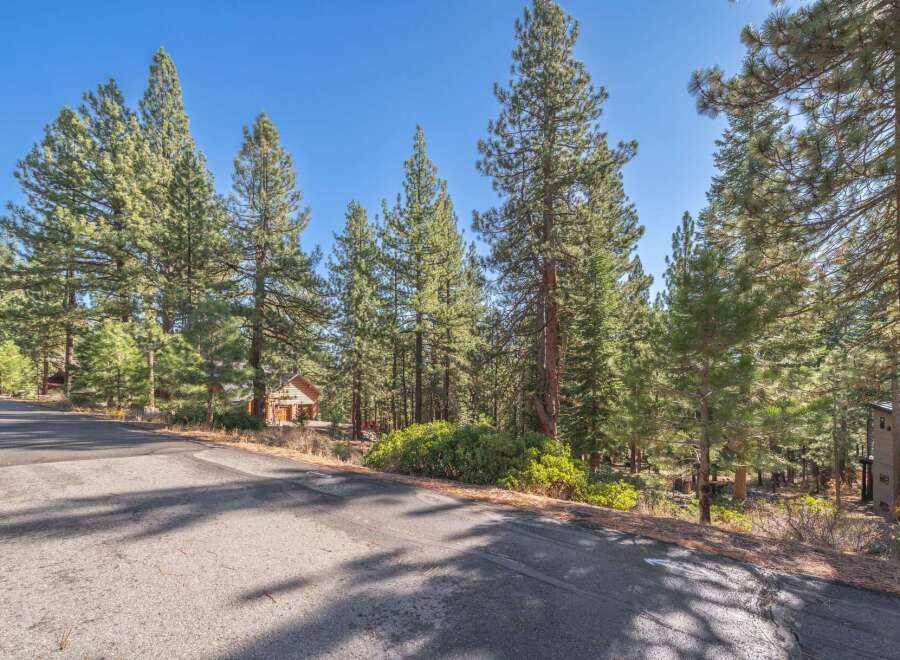 Discover your dream home nestled in a serene, wooded setting.