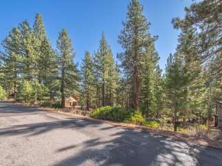 Discover your dream home nestled in a serene, wooded setting.