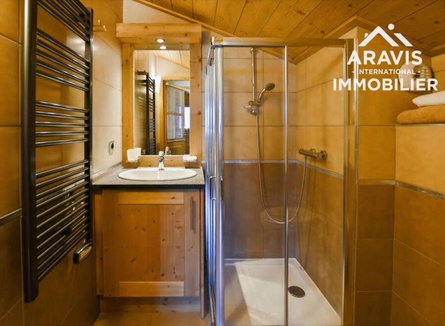 Discover the charm of this beautifully designed bathroom, perfect for a relaxing retreat.