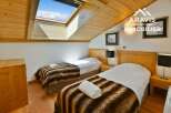 Discover a cozy bedroom retreat in this charming property.