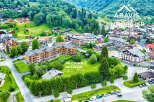 Discover Les Chalets de Layssia, a stunning property nestled in a picturesque mountain village.
