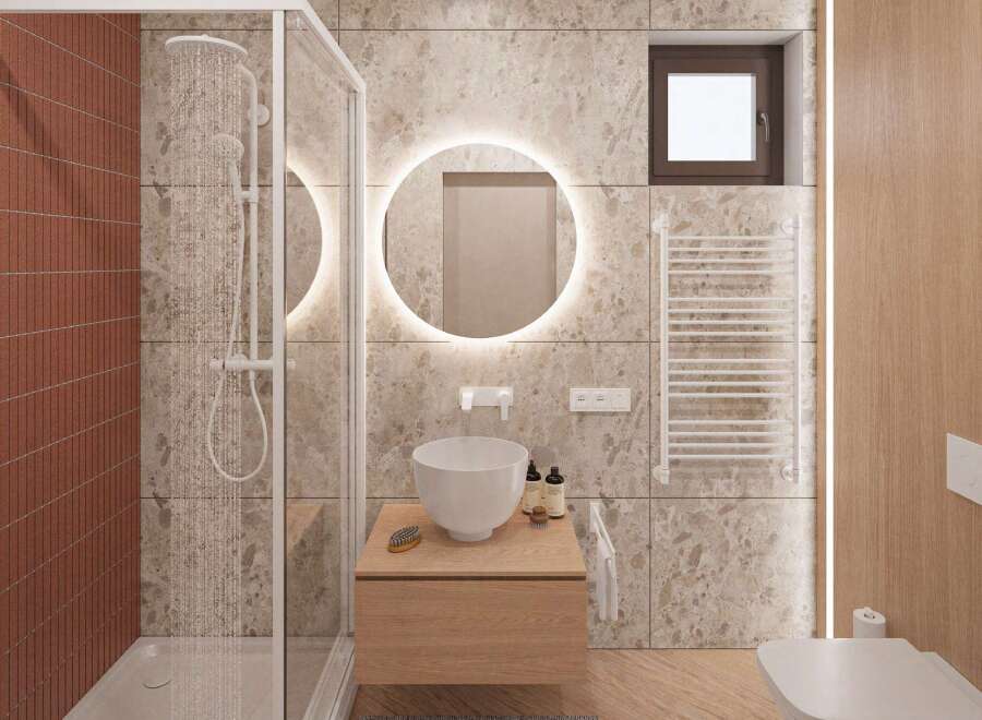 Step into a modern bathroom oasis! This stunning space features a sleek, frameless shower, a stylish floating vanity, and a chic, round mirror with integrated lighting.