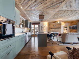 Experience rustic elegance in this stunning property, featuring a beautifully designed kitchen with modern appliances and ample storage.